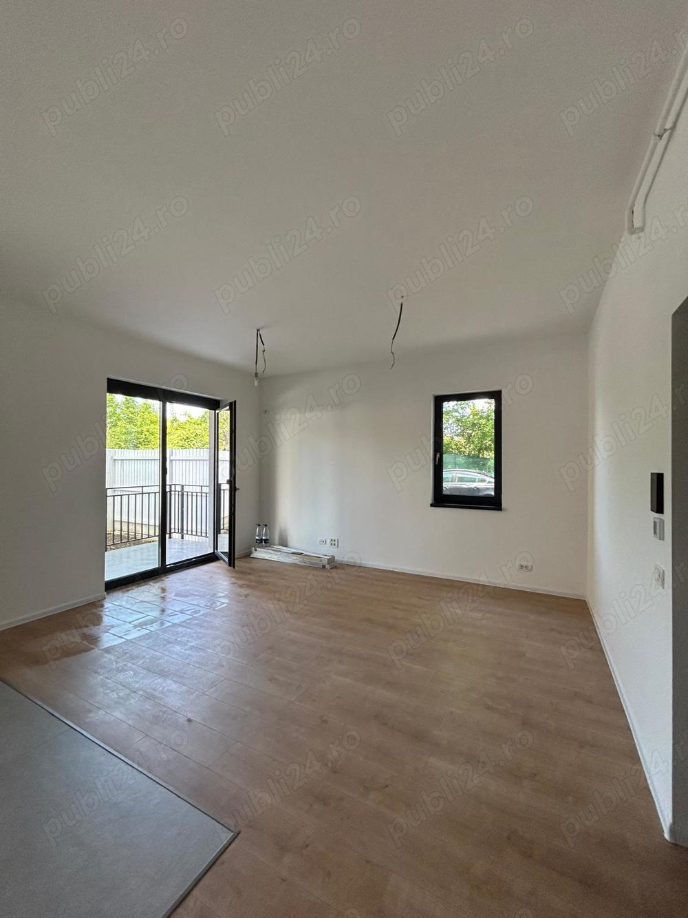 Apartament ?n bloc nou cu loc de parcare inclus si curte propie
