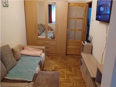 Decomandat cu 2 bai, 3 balcoane la etajul 2 cu garaj sub bloc